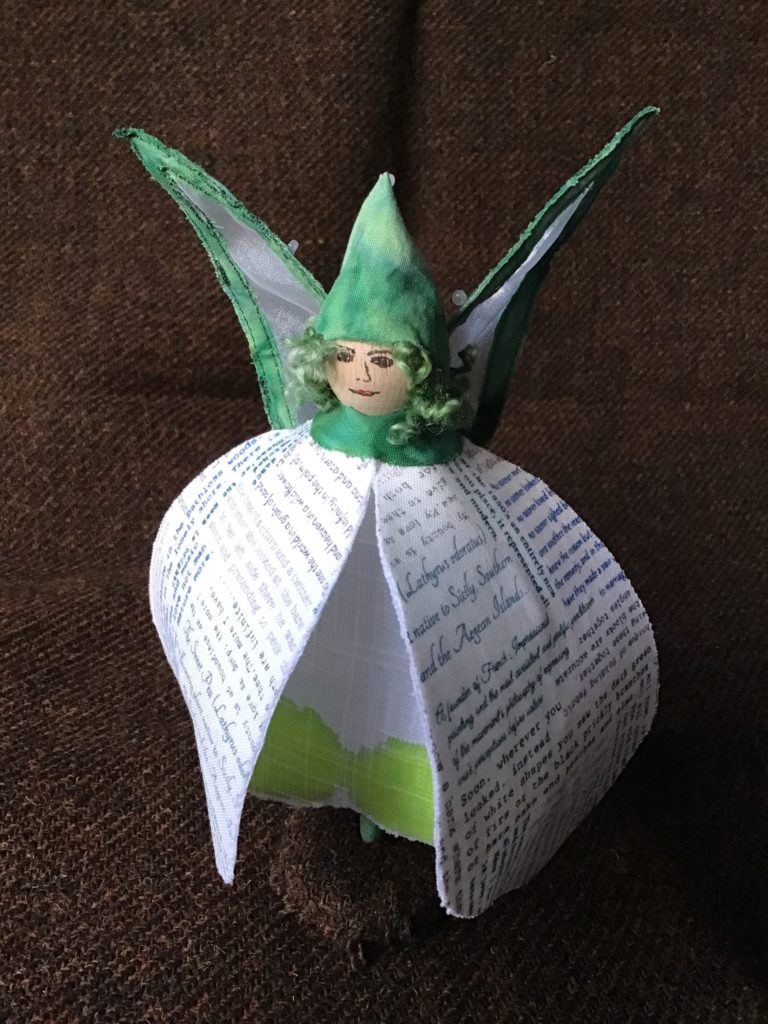 A handmade sculpture of a snowbell-like fairy.
