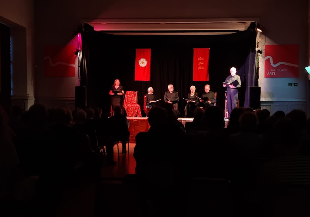 The performance of 'Heroic Strife Famed Afar' by Crieff Drama Group, taken from behind the audience during the show.